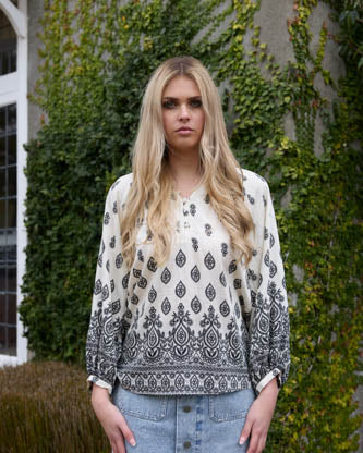 Black and cream patterned shirt