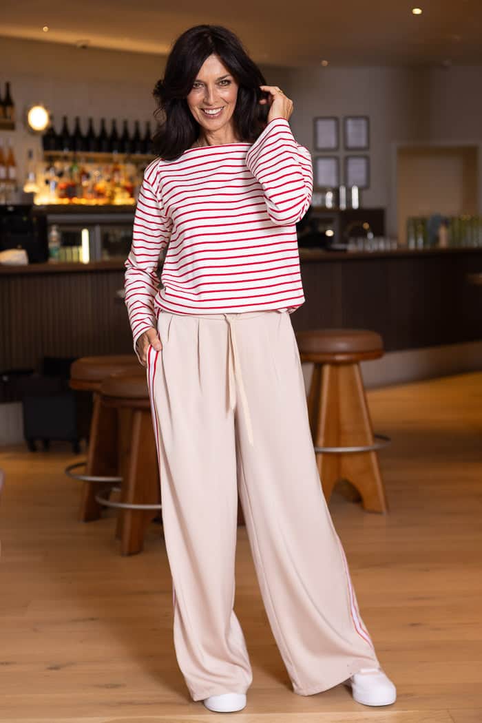satin wide leg cream pant with red cream side trim