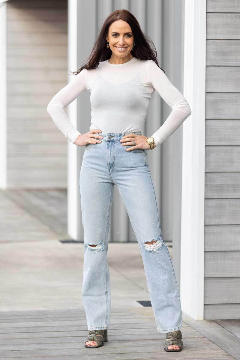 light blue straight leg jean ripped