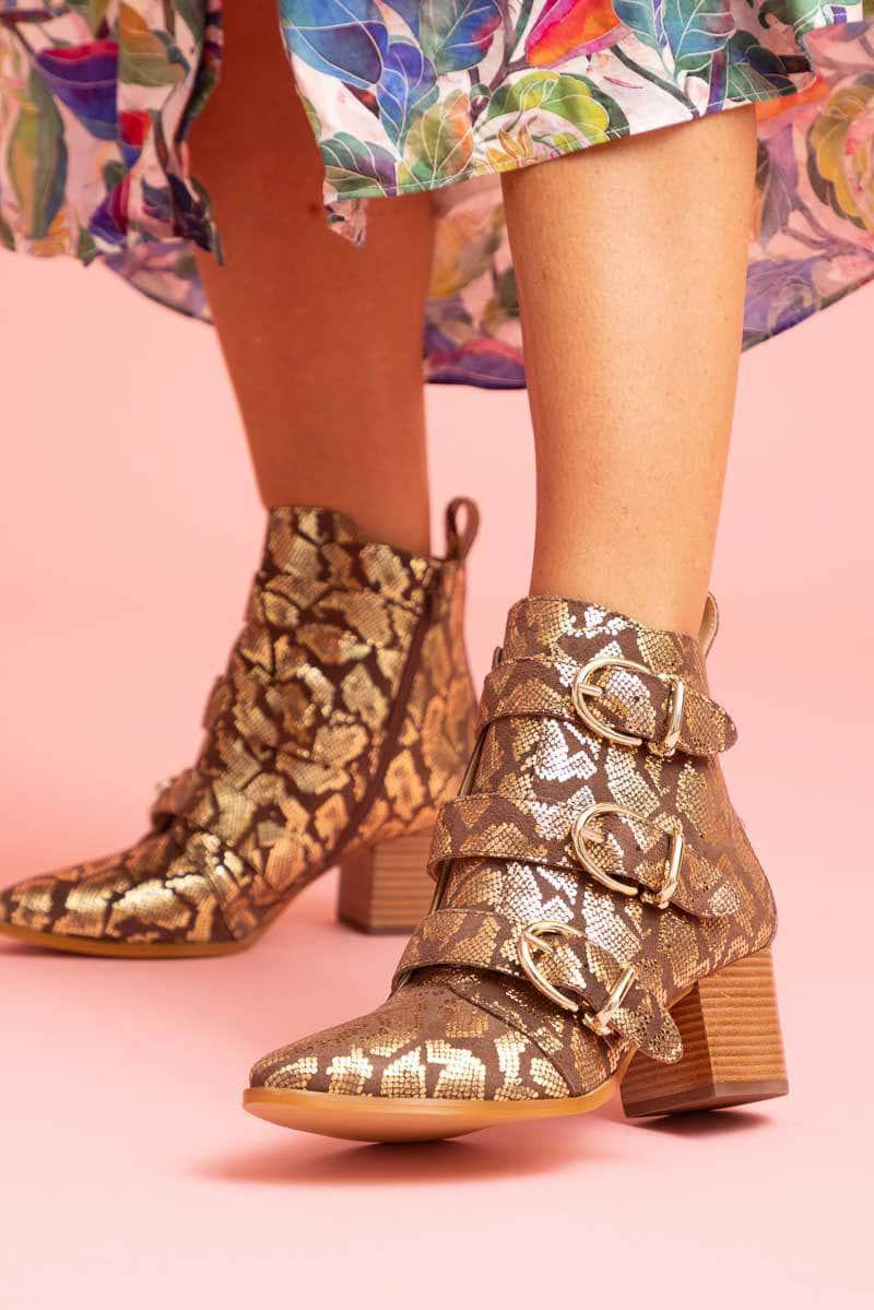 gold snake print boot belted