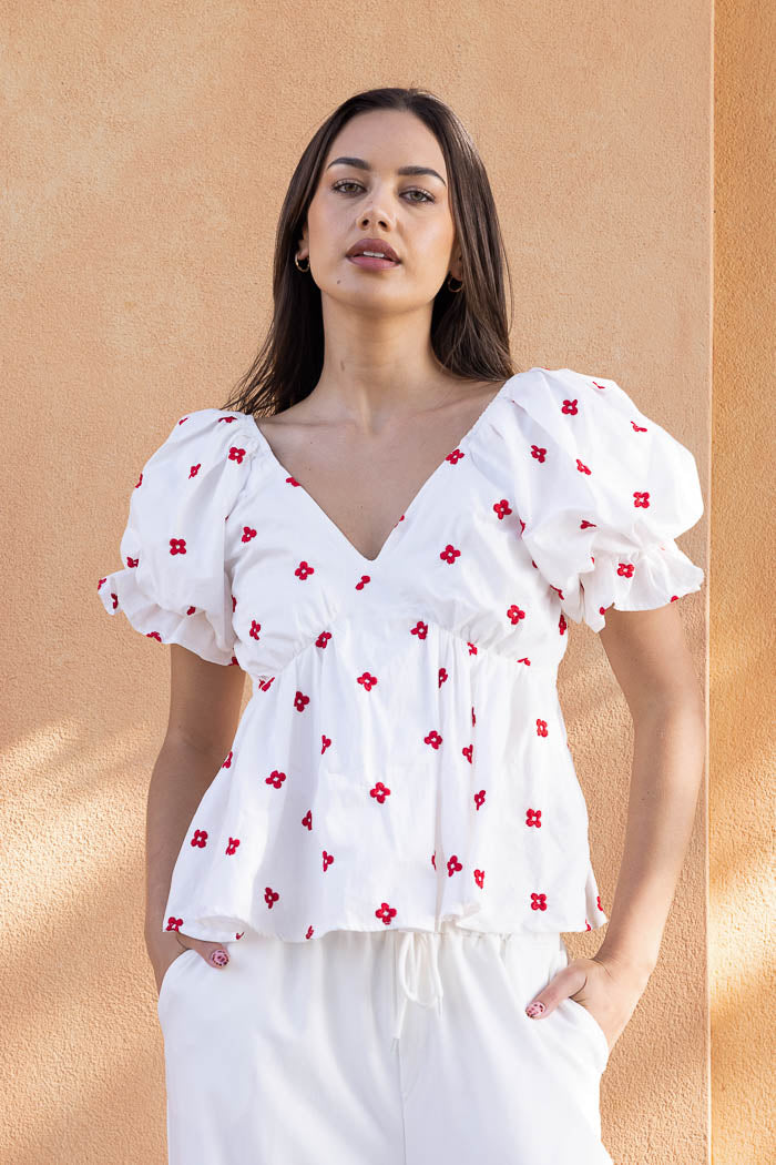 White blouse with red embroidery
