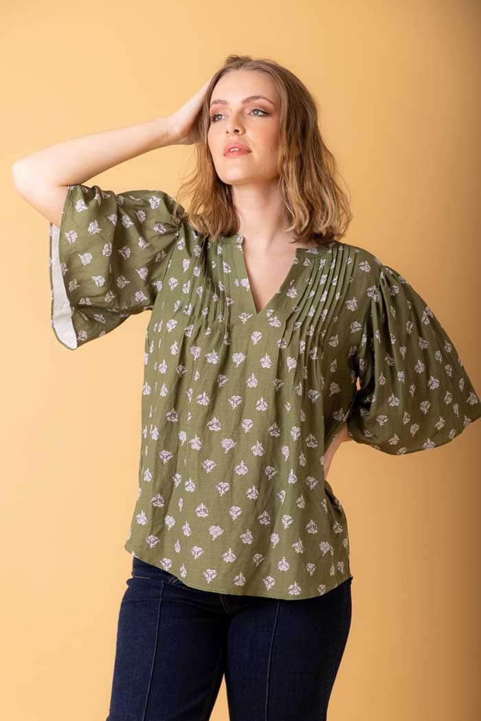 green pintuck V neck top