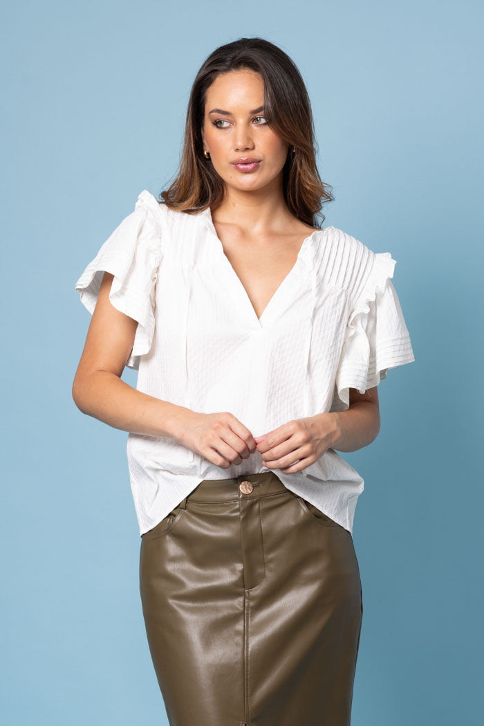 white blouse pintuck