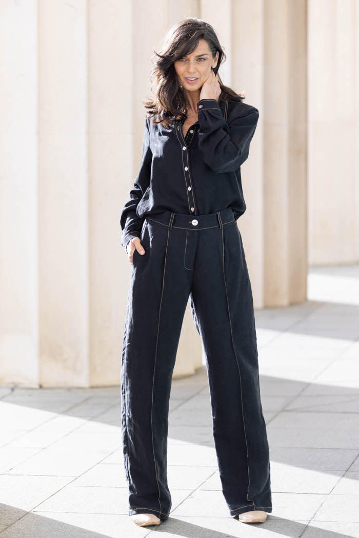 black pants brown stitching