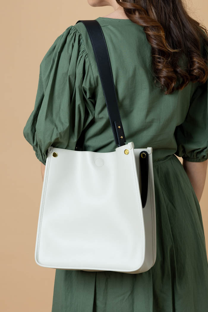 white leather tote bag
