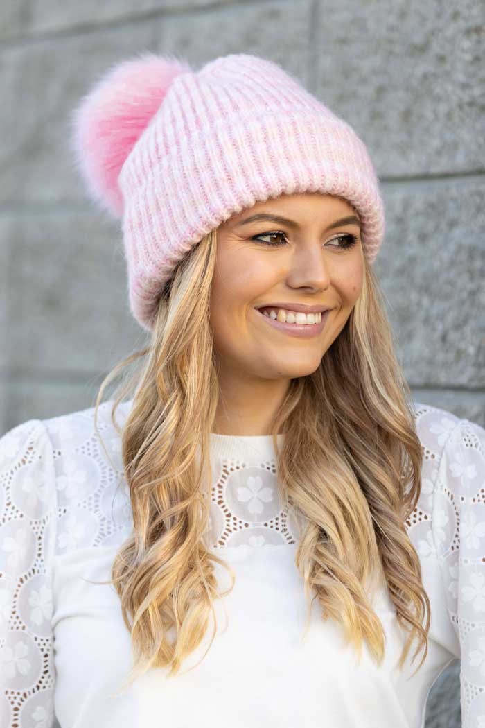 pink knitted beanie bobble