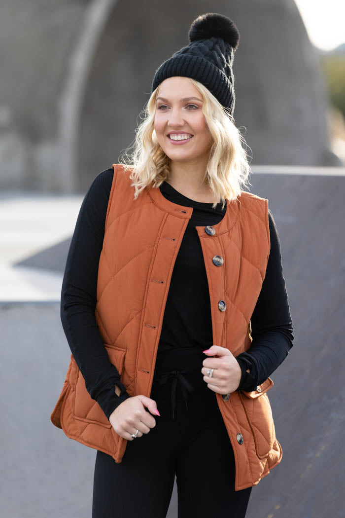 rust orange quilted vest