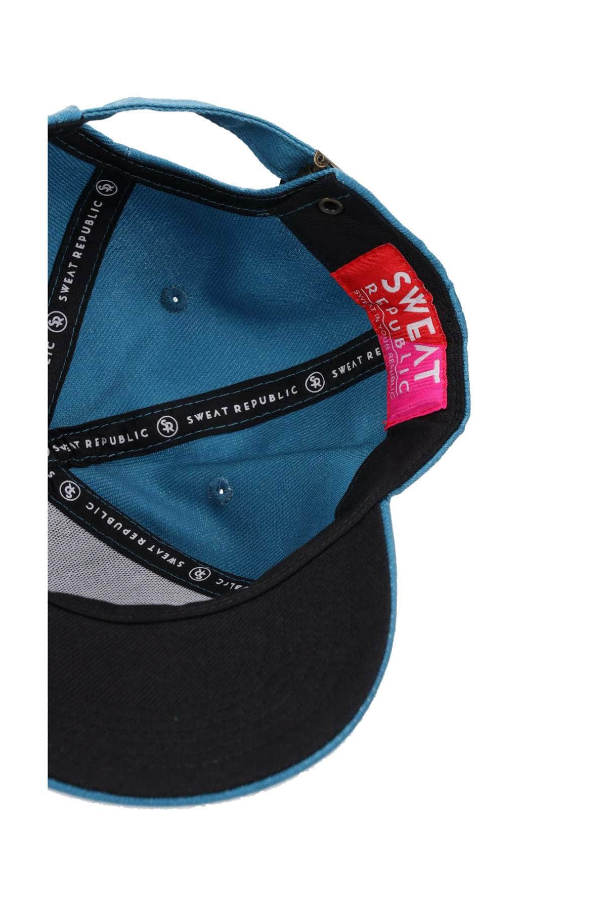 teal sports cap with white logo
