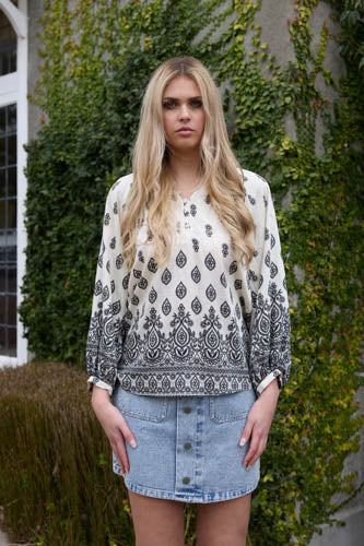 Black and cream patterned shirt