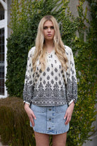 Black and cream patterned shirt