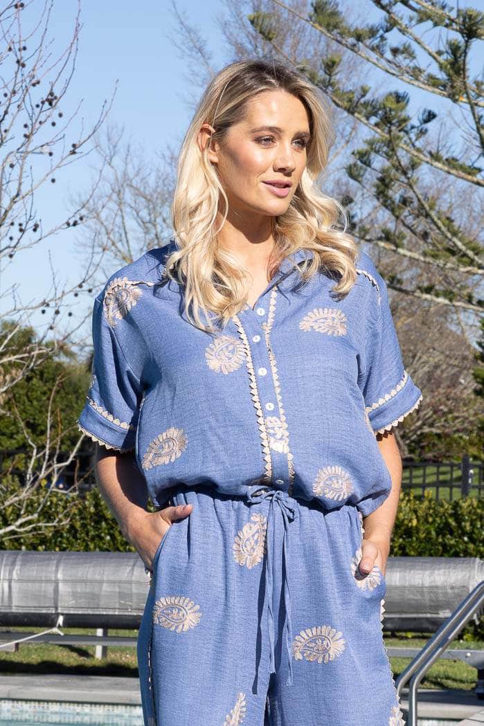 blue relaxed buttoned up shirt with embroidered beige paisley