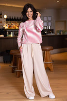 satin wide leg cream pant with red cream side trim
