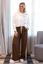 wide-leg brown pants with cream side stripe