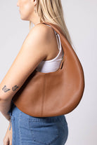 brown circle leather handbag
