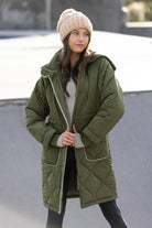 green quilted coat