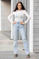 light blue straight leg jean ripped