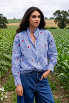 blue striped buttoned up shirt with red hearts embroidery