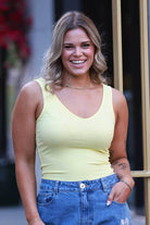yellow v neck tank