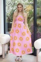 pink maxi dress with sun print
