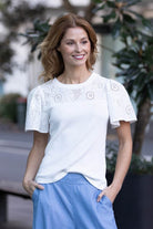 white floral embroidered ribbed bodice shirt