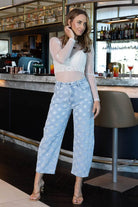 light blue patterned barrel jeans