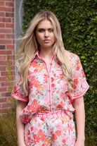 Pink floral button up shirt