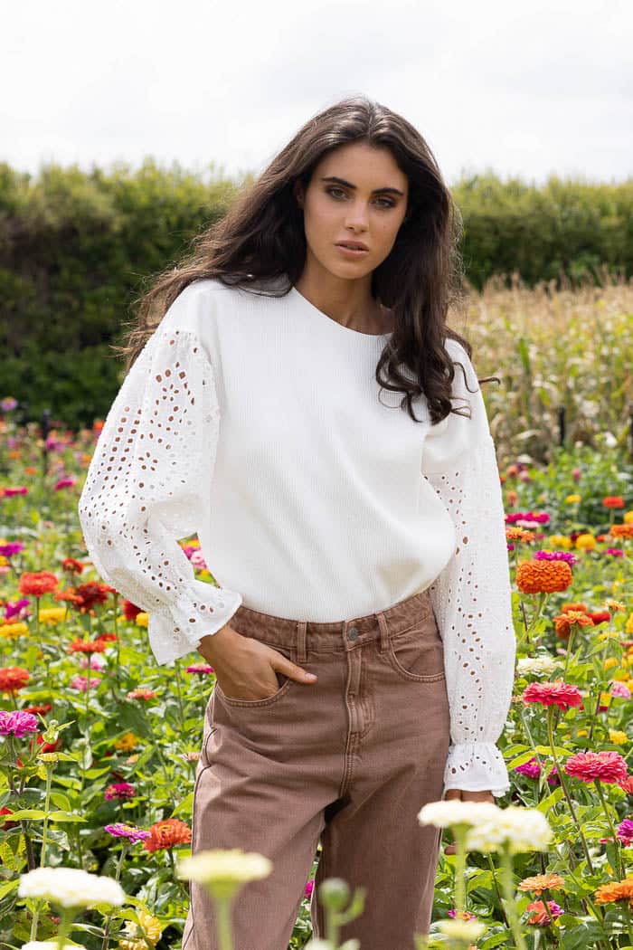 white ribbed top with embroidered sleeves