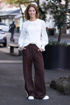 dark brown chocolate wide leg trackpant with cream side stripes