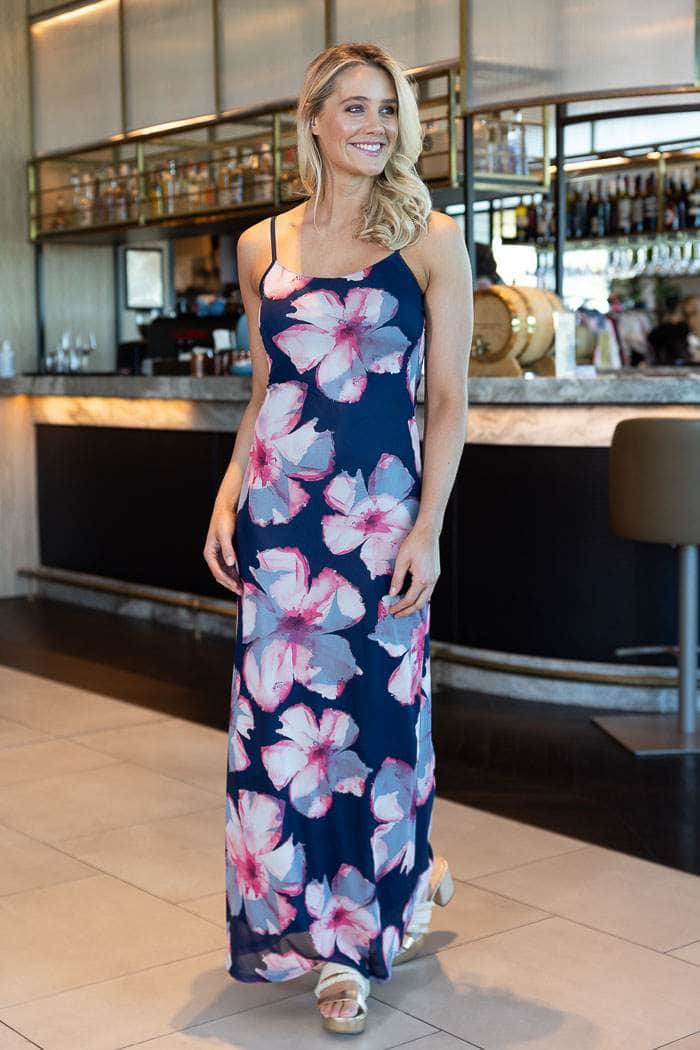mesh navy blue maxi dress with a pink and white hibiscus floral print