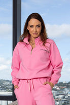 pink quarter zip sweatshirt
