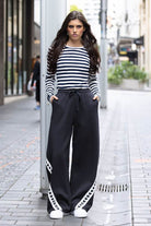 black pant with cut out hearts