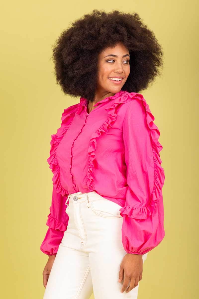 pink frilly blouse