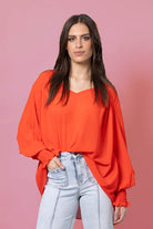 orange oversized top