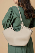 beige leather handbag