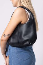 black circle leather handbag