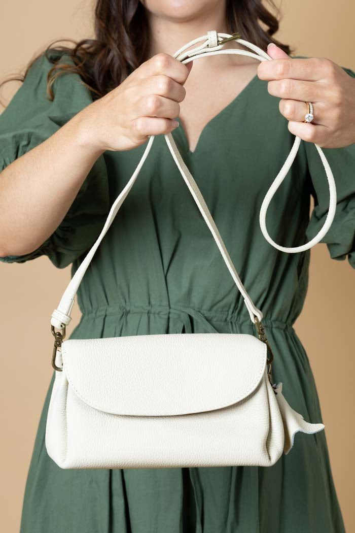 white leather handbag