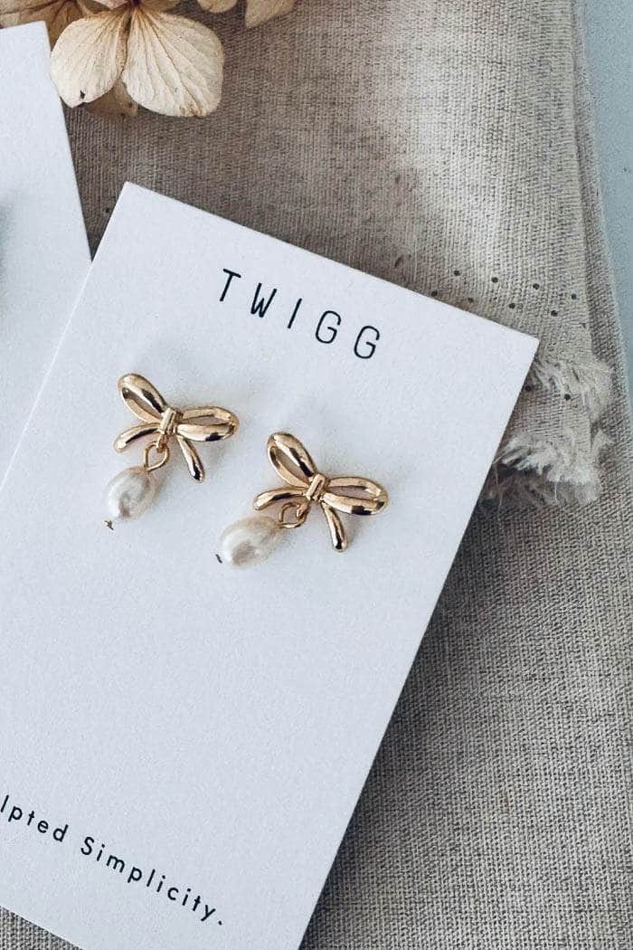Twigg Bow Pearl Studs Gold