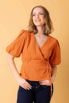 orange embroidered wrap top