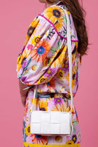 white leather handbag