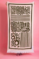 beige floral beach towel