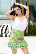 green ruched mini skirt
