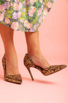 snake print gold heel