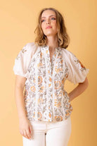 white floral blouse shirt