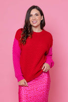 red knitted sweater