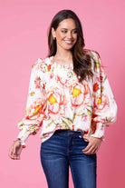 peach floral blouse top