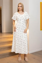 white midi dress with black embroidered heart