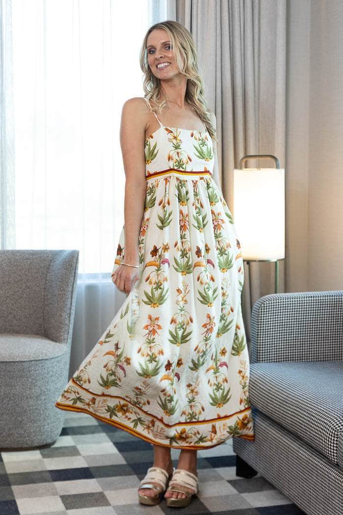 spaghetti-strap maxi dress with a colorful botanical print
