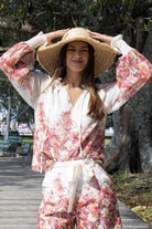 Pink and cream floral blouse