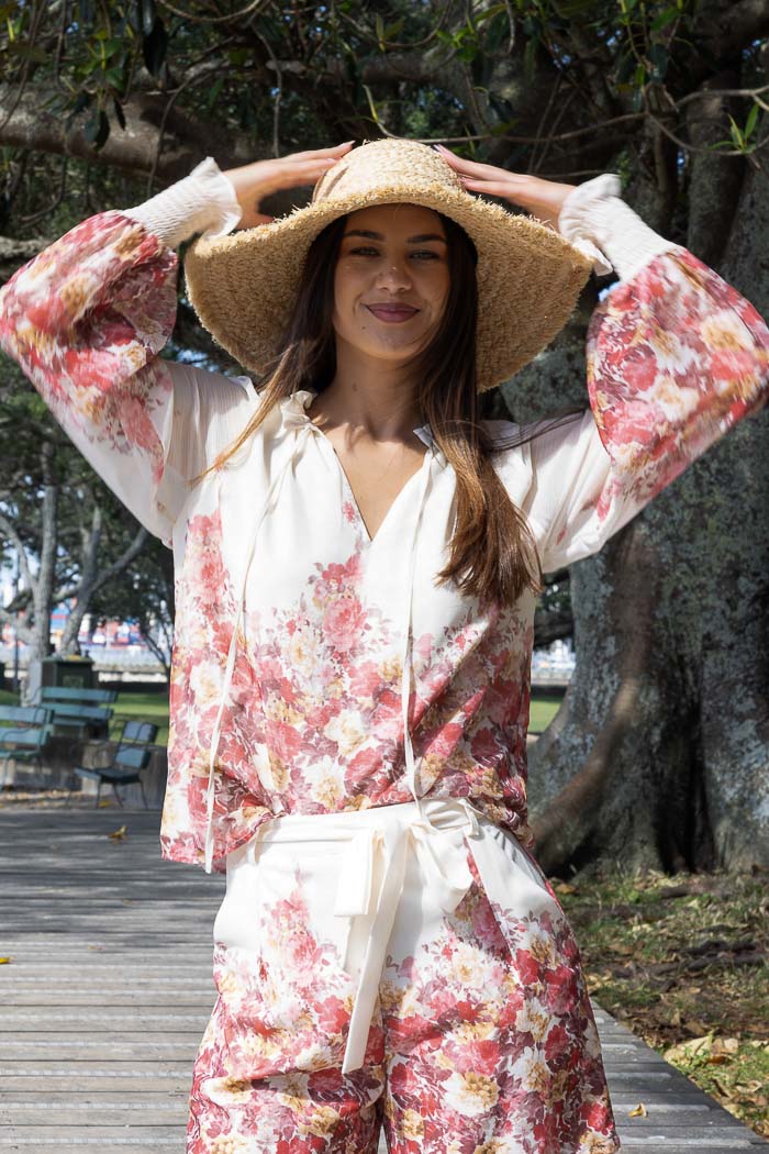 Pink and cream floral blouse