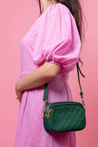 small green leather handbag